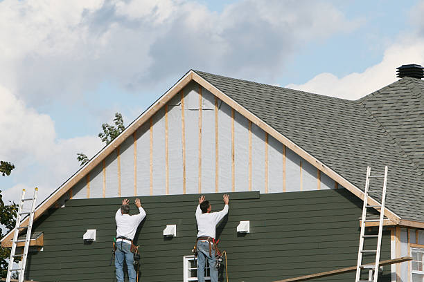 Professional Storm Damage Siding Repair technician working in Hummelstown, PA